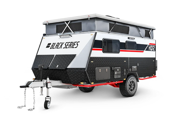 Black Series HQ12 off-road travel trailer being towed