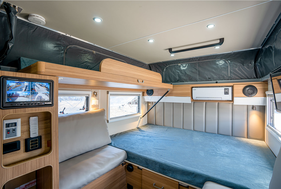 HQ12 interior with expanded sleeping area and lounge