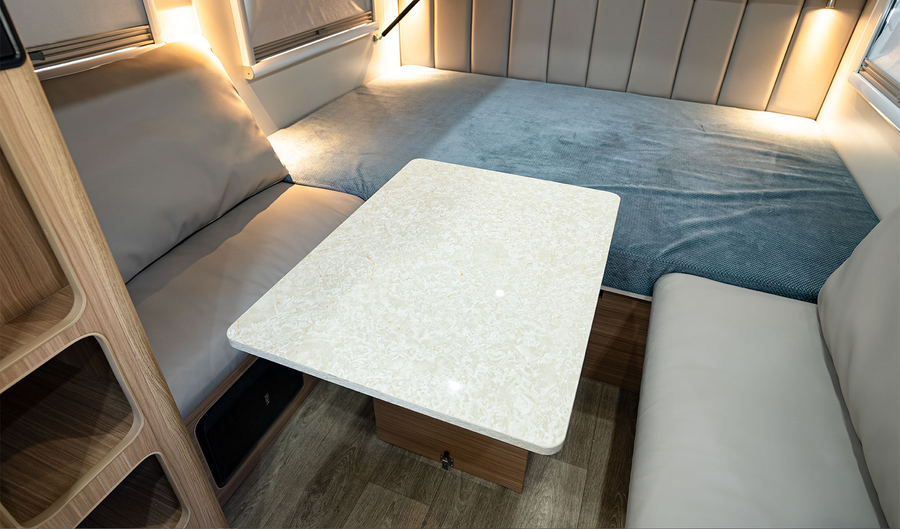 HQ12 dining table with seating and converted bed