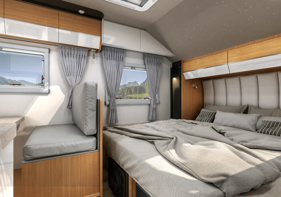 HQ15 fixed queen bed, cabin windows and overhead storage