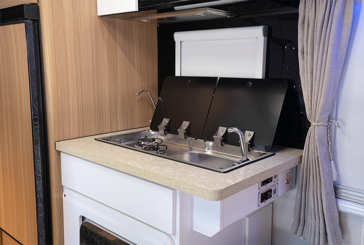 HQ17 indoor kitchen with covered stove and sink
