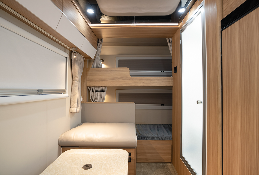 HQ17 lounge seating and two rear bunk beds
