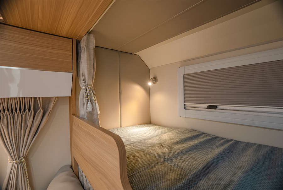 HQ17 upper bunk with reading light and privacy curtains